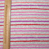 Red, pink and purple striped cuddly sweatshirt with heather gray background