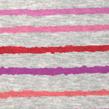 Red, pink and purple striped cuddly sweatshirt with heather gray background