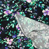 Viscose imprimée papillons de fleurs fond noir