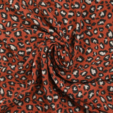 Viscose imprimée léopard fond brique