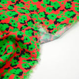 Printed viscose Green cutting red background