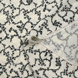 Viscose imprimée chaîne de fleurs fond blanc cassé