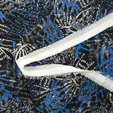 Mousseline imprimée lurex feu d'artifice bleu fond noir