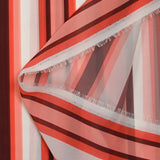 Polyester voile printed with coral, off-white and mahogany stripes