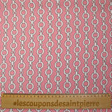 Lightweight polyester satin with white chain link print on pink background