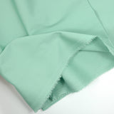 Satin de coton vert eucalyptus