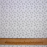 Popeline polycoton imprimée rayée et branche fond gris