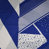 Mousseline crinkle satinée imprimée pois graphique blanc et bleu roi