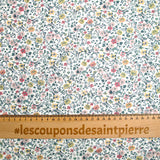 Cotton printed aurora flowers and yellow flowers white background per meter
