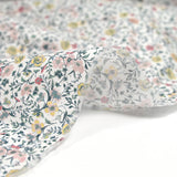 Cotton printed aurora flowers and yellow flowers white background per meter