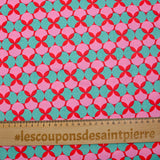 Popeline enduite imprimée pois & trèfle vert fond rouge