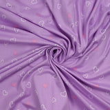 Jersey tout doux imprimé petits cœurs fond violet