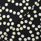 Crêpe viscose imprimé à pois ivoire fond bleu nuit