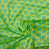 Popeline enduite imprimée végétal turquoise fond citron