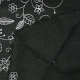 Twill of polyester embroidered soil black background