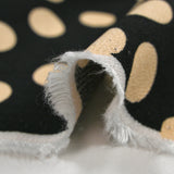 Crêpe viscose imprimé à pois beige fond noir