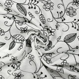 Twill de polyester brodé Solène fond blanc