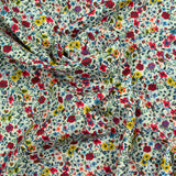 Cotton printed Aurora Flowers Red and Yellow White background per meter