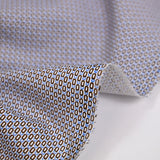 Popeline polycoton imprimée fantaisie bleu et marron