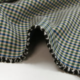 Polyester lourd à carreaux vert et marine fond beige