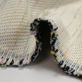 Jacquard de polycoton flammé multicolore fond écru