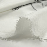 Twill de polyester brodé Solène fond blanc