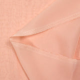 Mousseline de 100% soie unie rose pêche