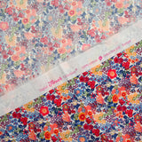 Cotton print Matilde orange and blue flowers per meter