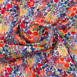 Cotton print Matilde orange and blue flowers per meter