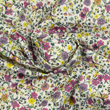 Coton imprimé Anna fleurs violet et jaune fond blanc au mètre