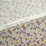 Coton imprimé Anna fleurs violet et jaune fond blanc au mètre
