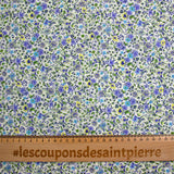 Cotton printed Giorgia purple flowers and blue background ecru per meter