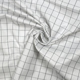 Popeline polycoton tissée-teinte à carreaux Barnabé gris fond blanc