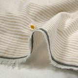 Dyed woven cotton embroidered daisy white and beige striped background