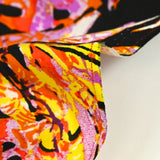 Viscose imprimée jungle jaune et violet fond noir