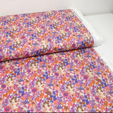Cotton print Matilde Flowers Coral and Lavender per meter