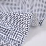 Popeline polycoton imprimée croisillons marine fond blanc
