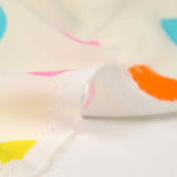 Viscose imprimée pois multicolore fond écru