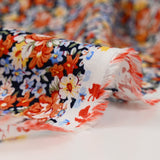 Viscose imprimée fleurs caramel fond marine