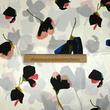 Silk satin printed with stylized flowers off-white background