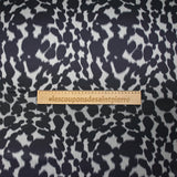 Satin de polyester imprimé fauve fond gris