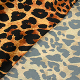 Satin polyester imprimé léopard fond doré