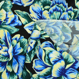 Satin polyester imprimé fleur jaune, verte et bleue fond noir