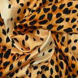 Satin polyester imprimé guépard fond camel