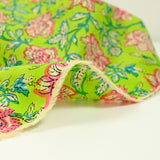 Indian cotton printed calcutta pink flower green background