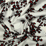 Satin polyester imprimé poésie rouge fond blanc
