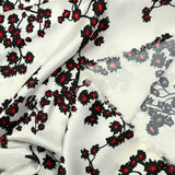 Satin polyester imprimé poésie rouge fond blanc