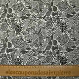 Jersey de coton imprimé jungle dangereuse fond blanc