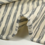 Jersey de coton piqué rayé fond écru