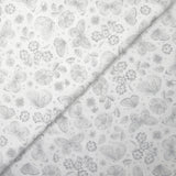 Piqué de coton imprimé papillons et fleurs fond blanc